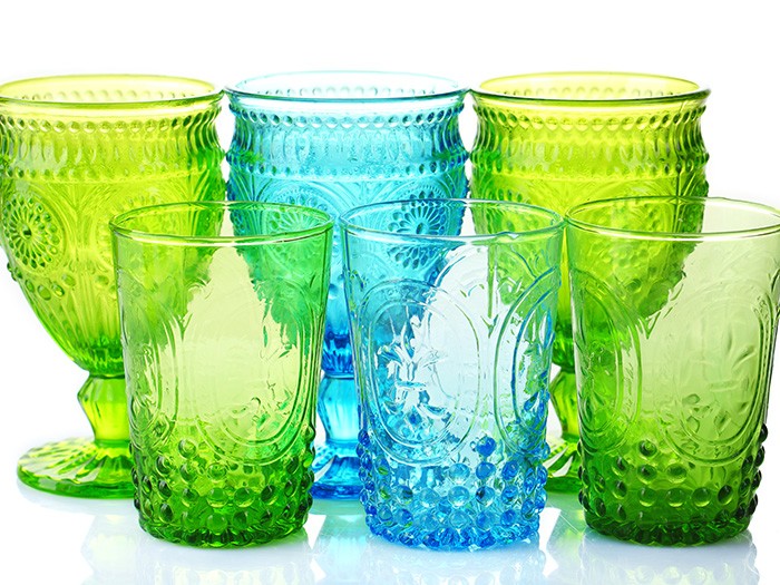Blue and green glass drinkware with embossed floral design